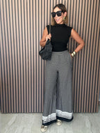 A Masterclass in Chic Wide-Leg Trousers