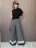A Masterclass in Chic Wide-Leg Trousers