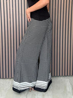 A Masterclass in Chic Wide-Leg Trousers