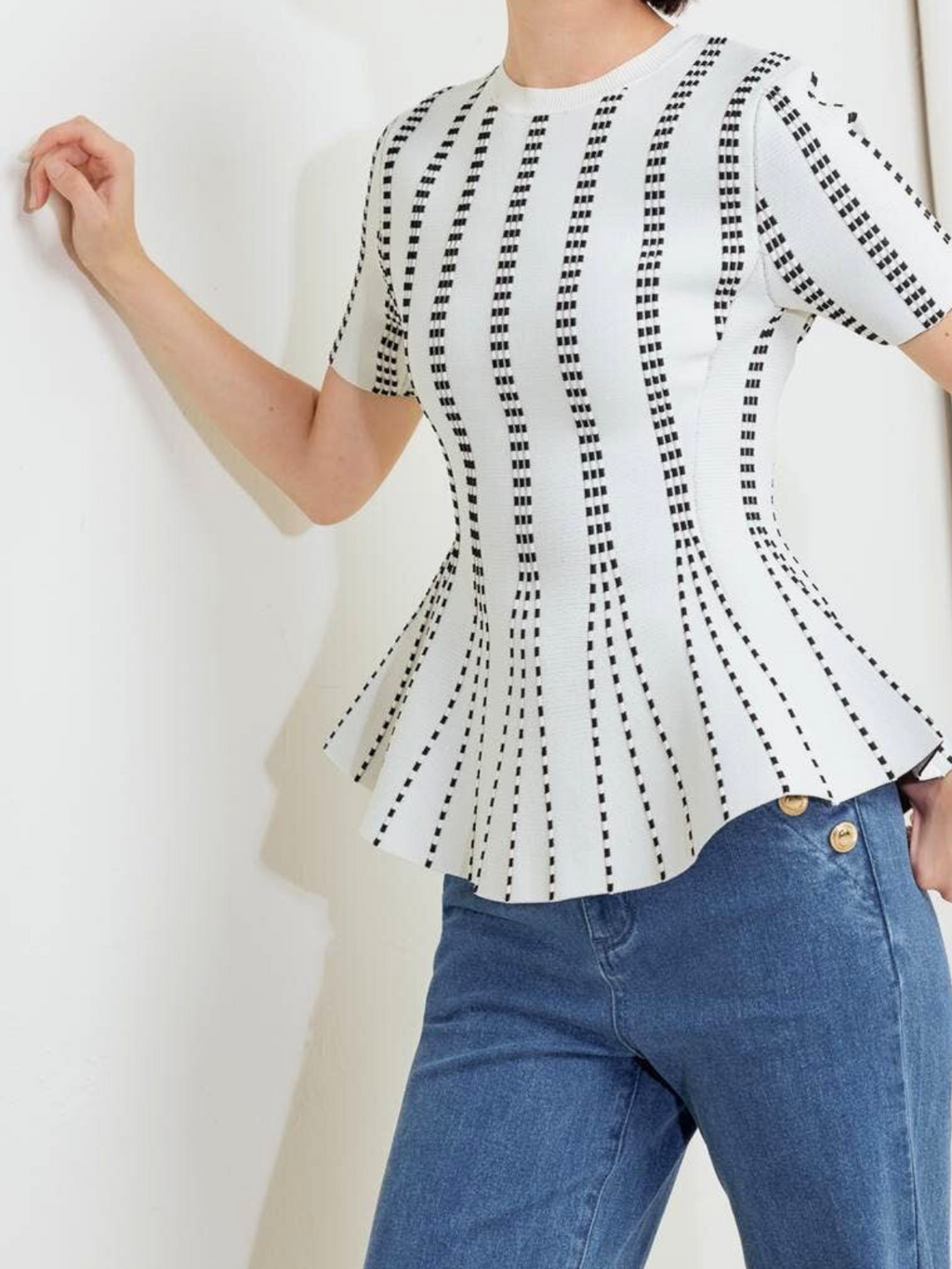The Metro Lines Peplum Knit Blouse