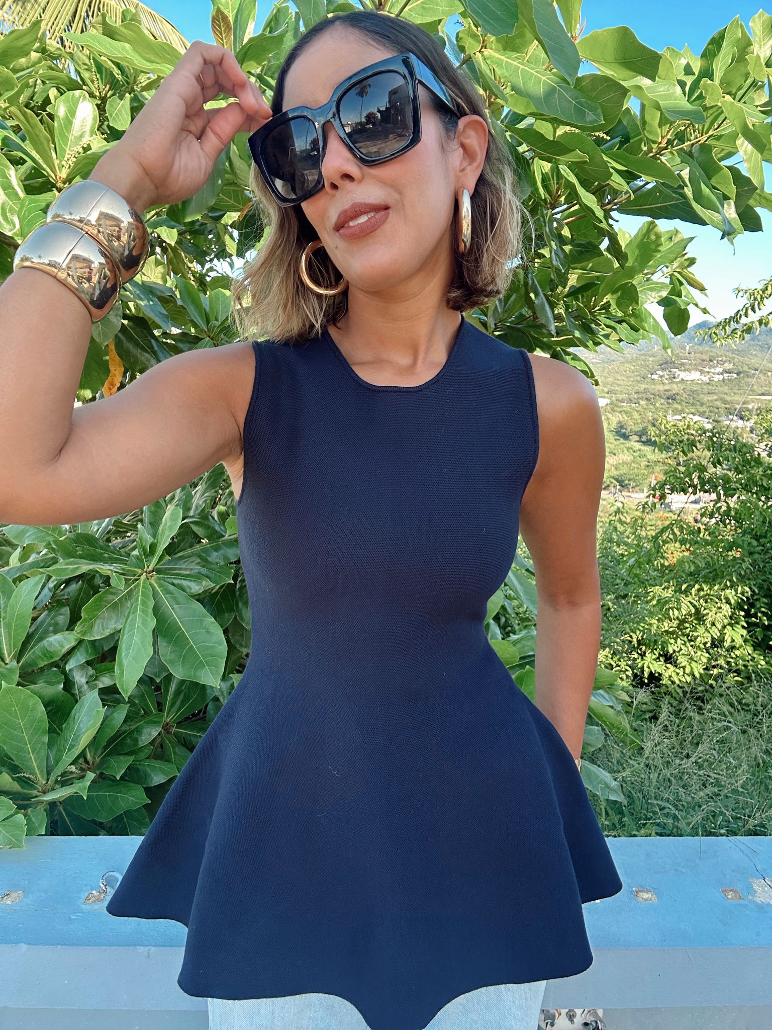 Anne Sleeveless Flared Peplum Top