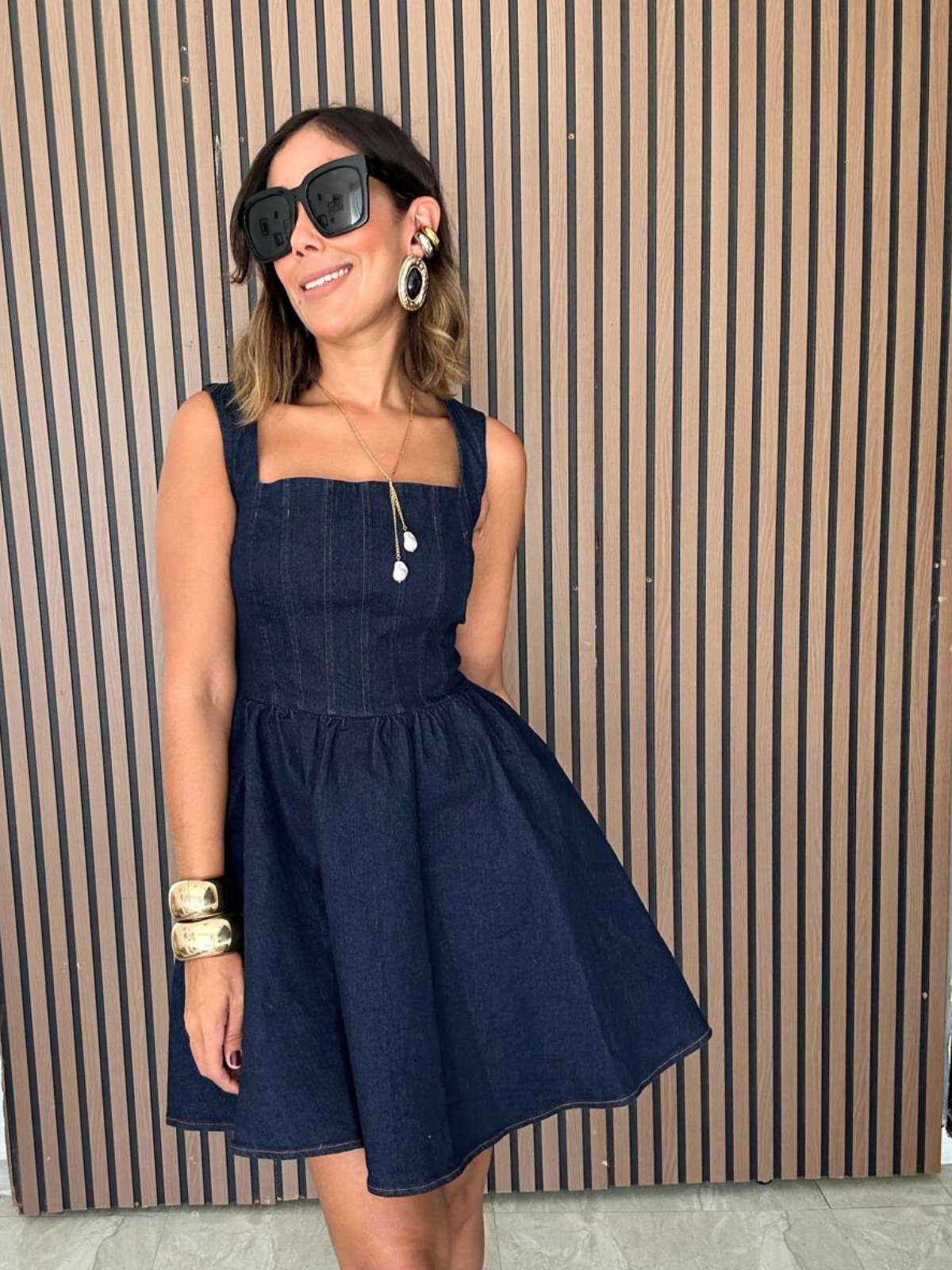 The Curve-Loving Denim Mini Dress